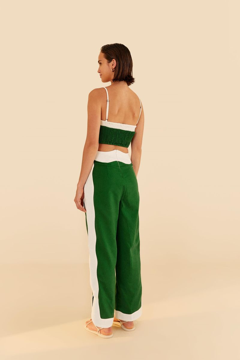 Vista-trasera-del-pantalon-de-pierna-ancha-bicolor-en-verde-y-blanco-con-cierre-invisible.