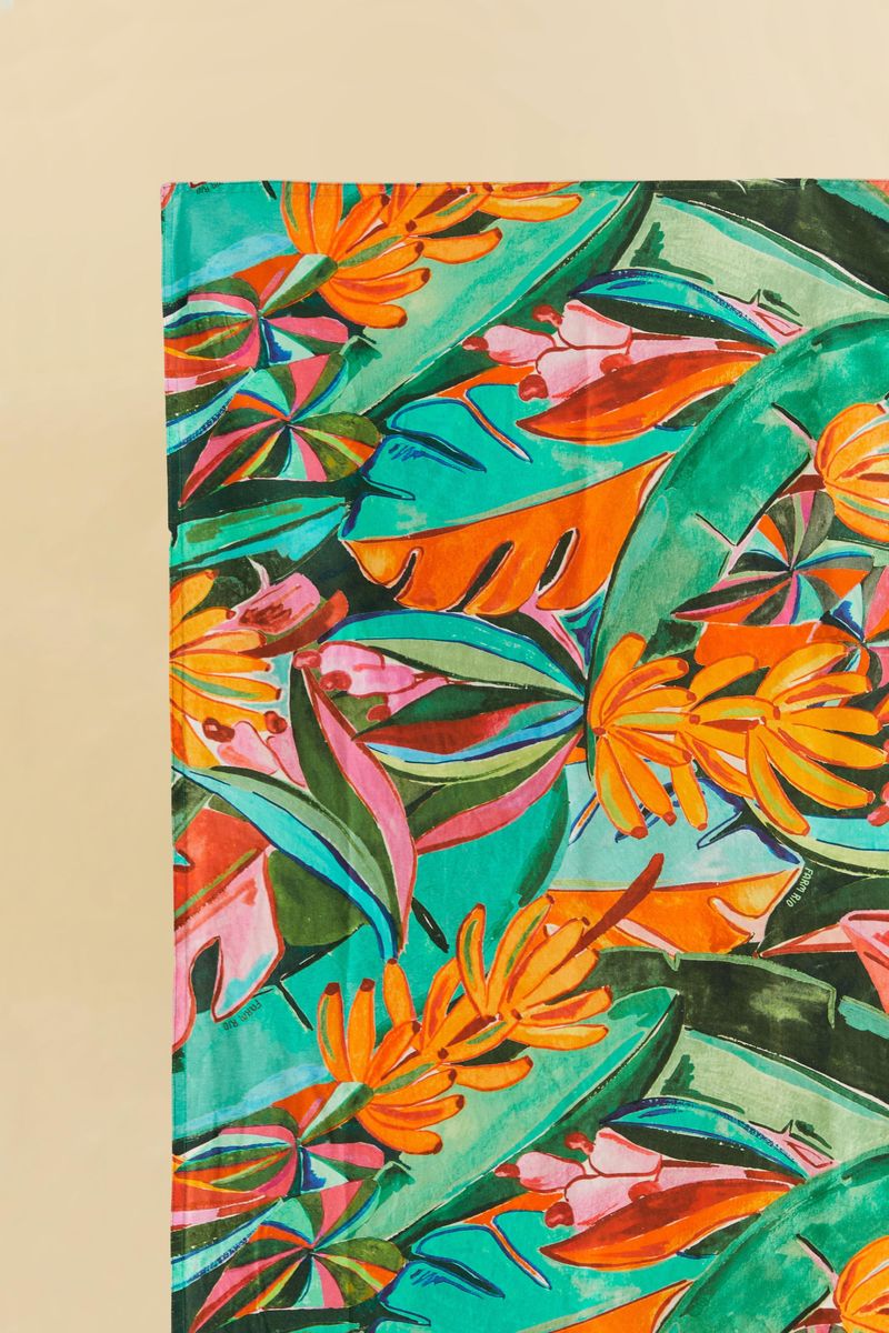 Detalle-del-estampado-de-la-toalla-Nhami-Follaje-mostrando-los-colores-y-elementos-tropicales.