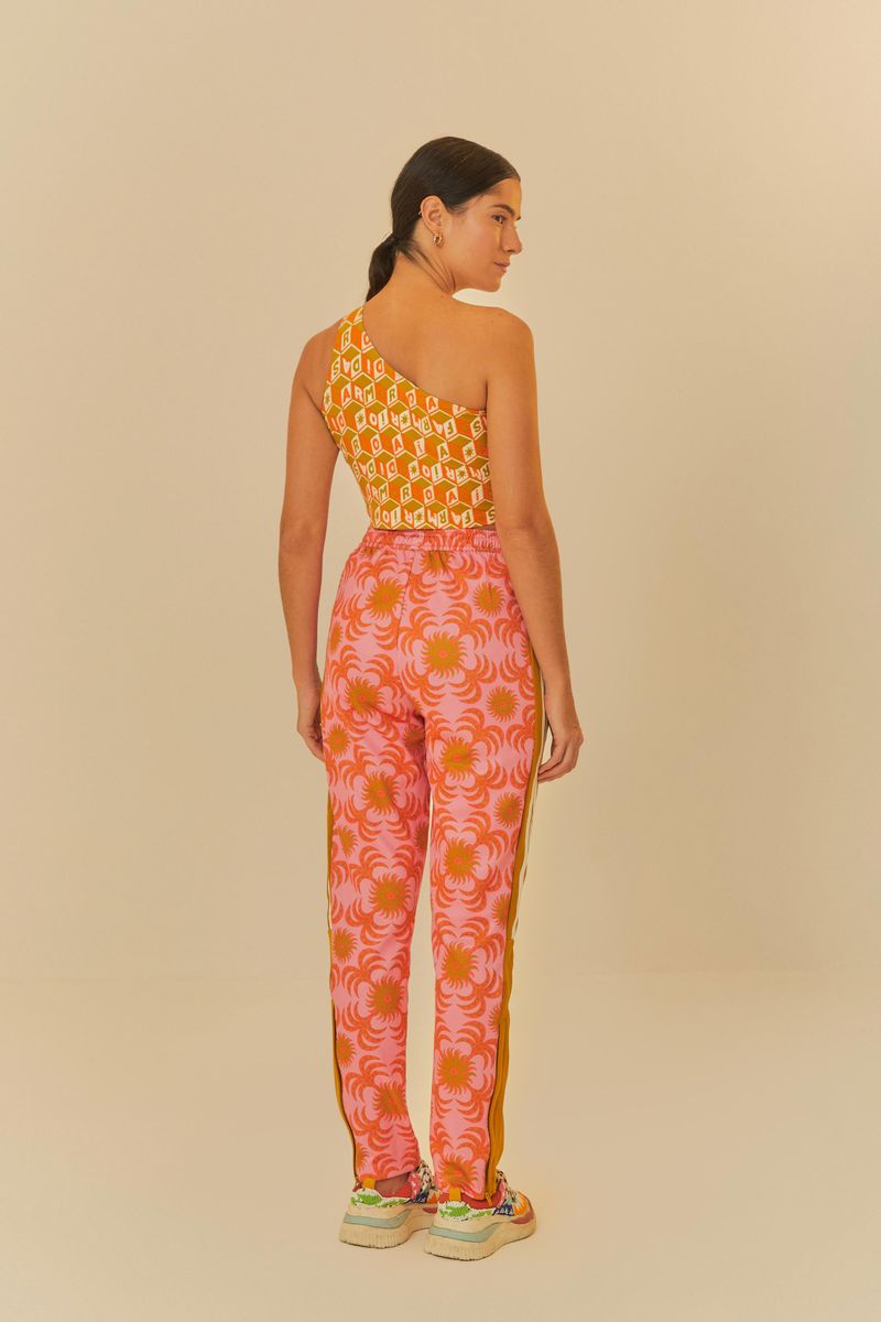 Vista trasera del Pantalón Adidas Palm Flower Rosa destacando el diseño vibrante.