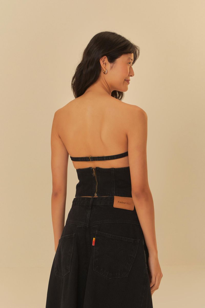 Corsé negro sin tirantes en denim, vista trasera.