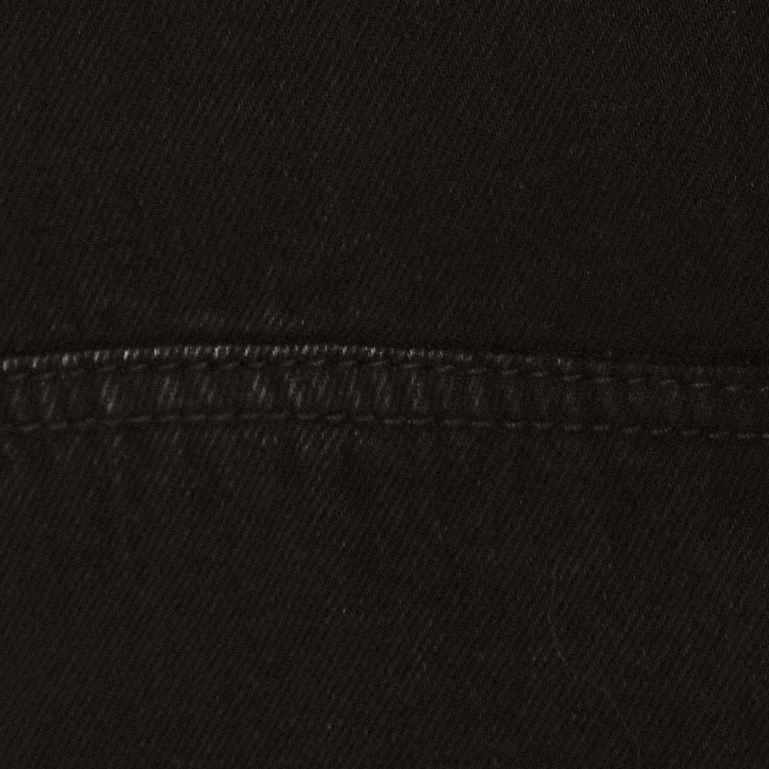 Corsé negro sin tirantes en denim, detalle de la tela.