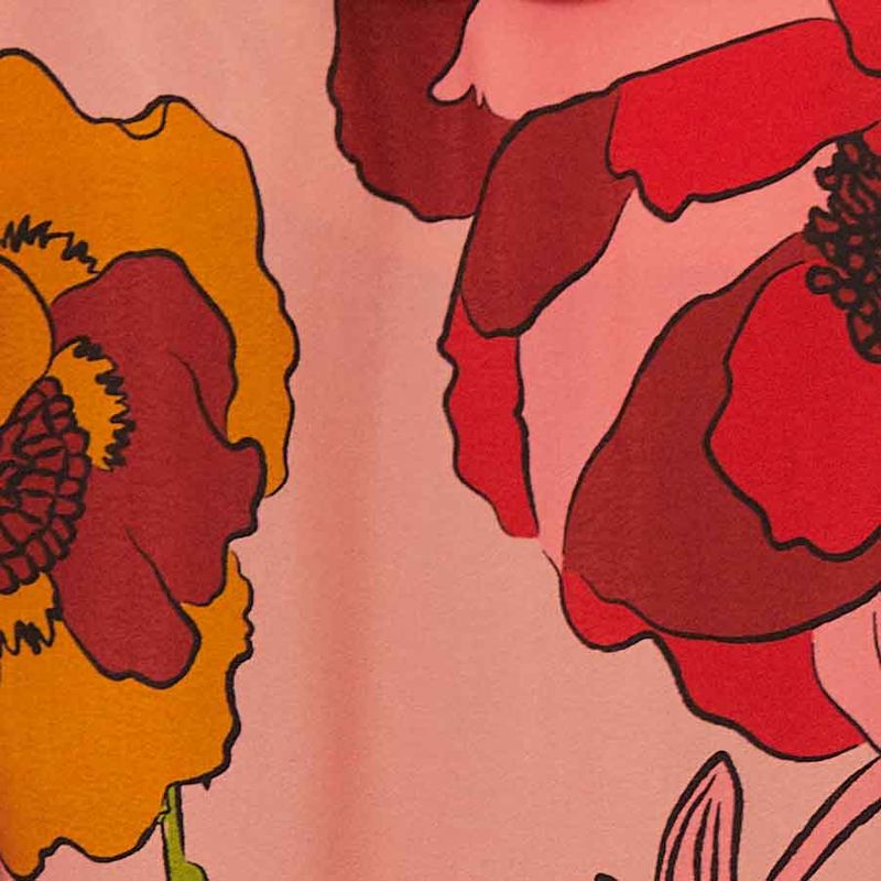 Primer-plano-del-estampado-floral-tropical-en-tonos-vibrantes.