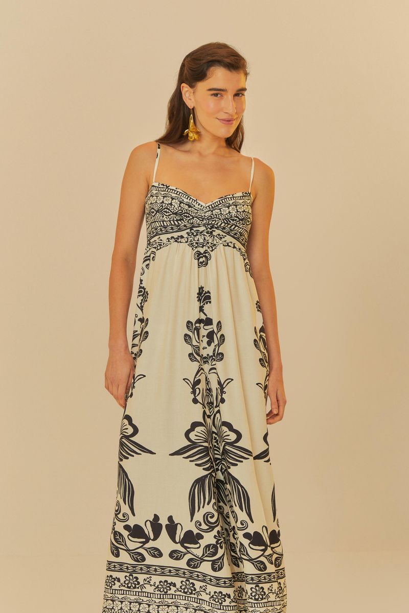 Enterito-Doce-Camino-visto-de-frente-con-estampado-botanico-en-tonos-beige-y-negro.