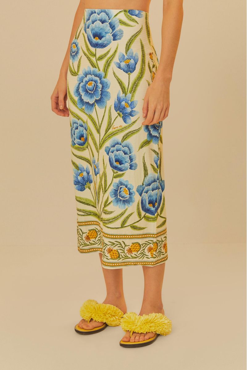 Primer-plano-de-la-falda-midi-Puglia-mostrando-detalles-del-estampado-floral.