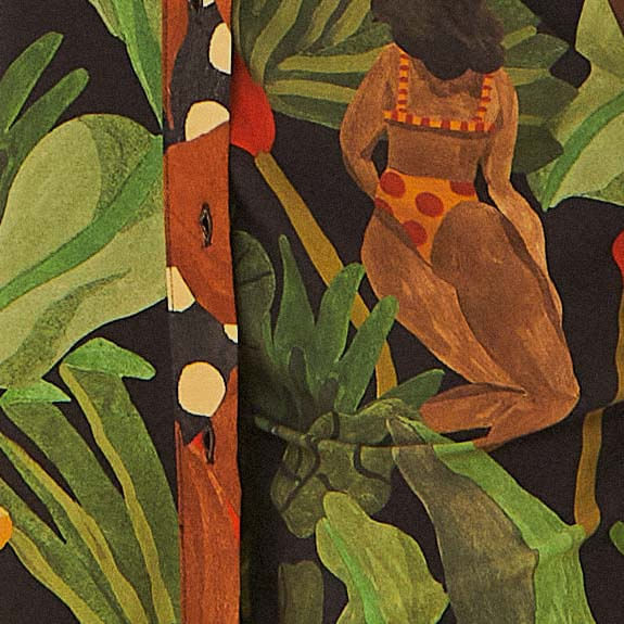 Imagen-de-cerca-del-estampado-tropical-del-pantalon-Belleza-Tropical-destacando-elementos-de-la-naturaleza.