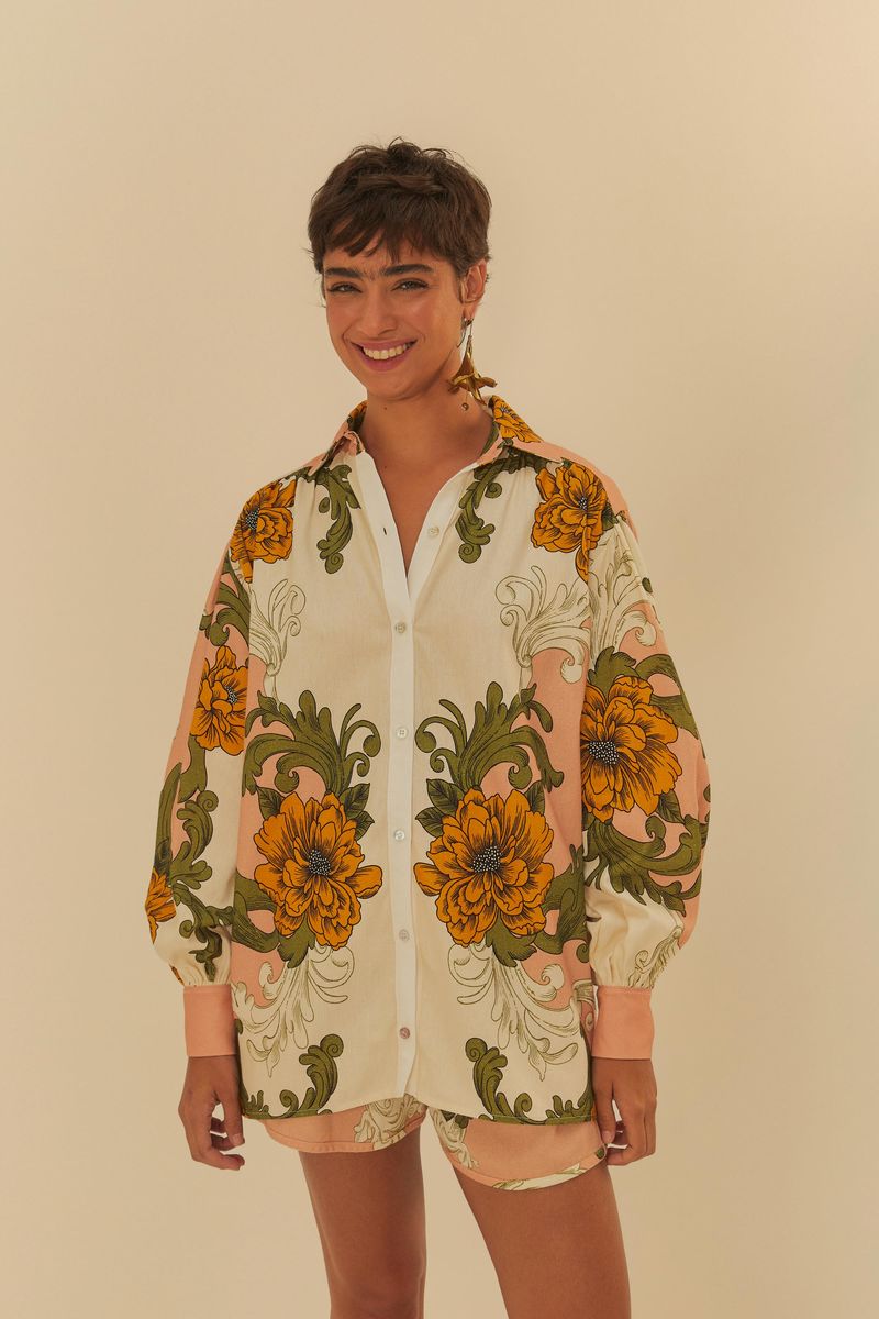 Camisa-Flor-Real-con-diseño-floral-vibrante-en-tonos-naranja-y-verde-vista-frontal.
