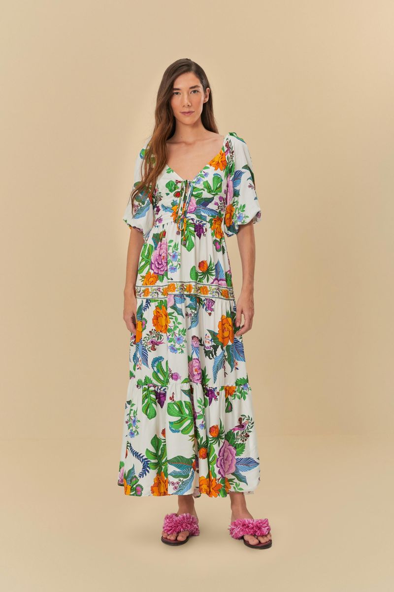 Vestido floral con escote corazón y mangas ajustables visto desde el frente.