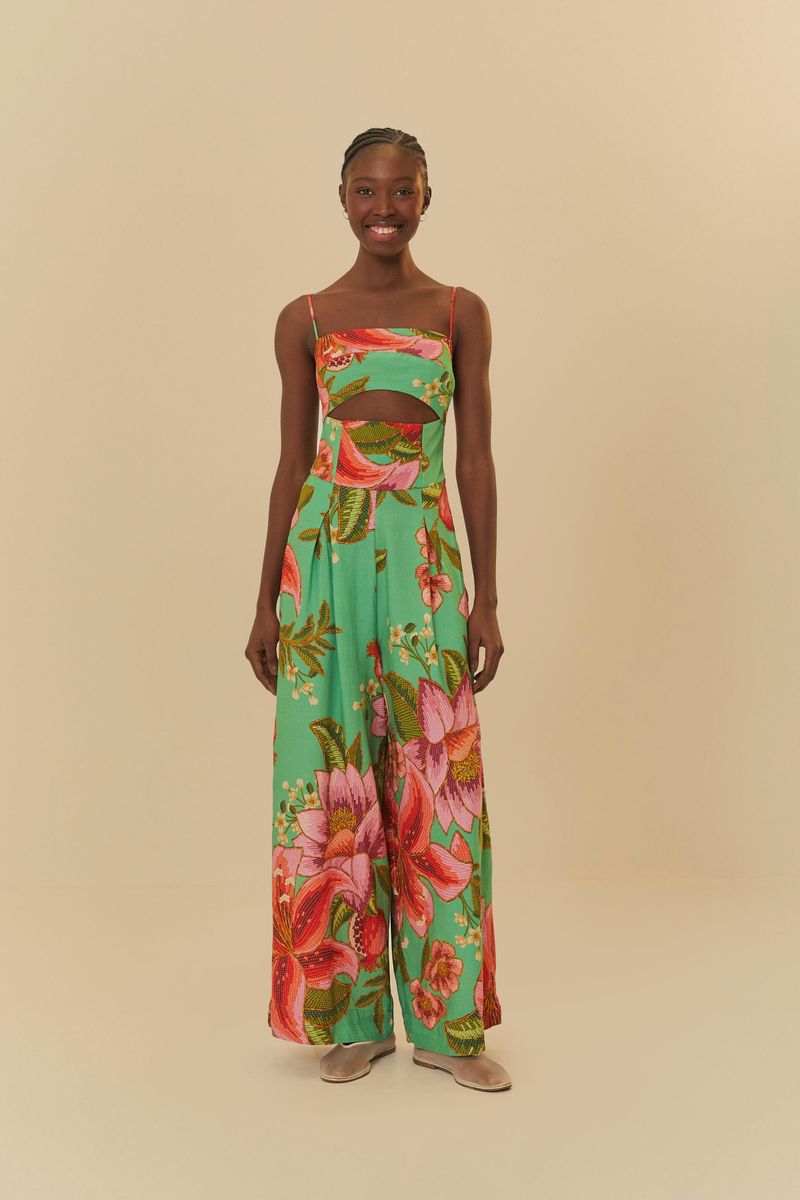 Enterito pantalona con estampado tropical vibrante visto de lado.