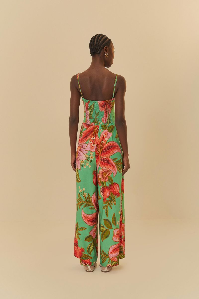 Enterito pantalona con estampado tropical vibrante visto desde atrás.