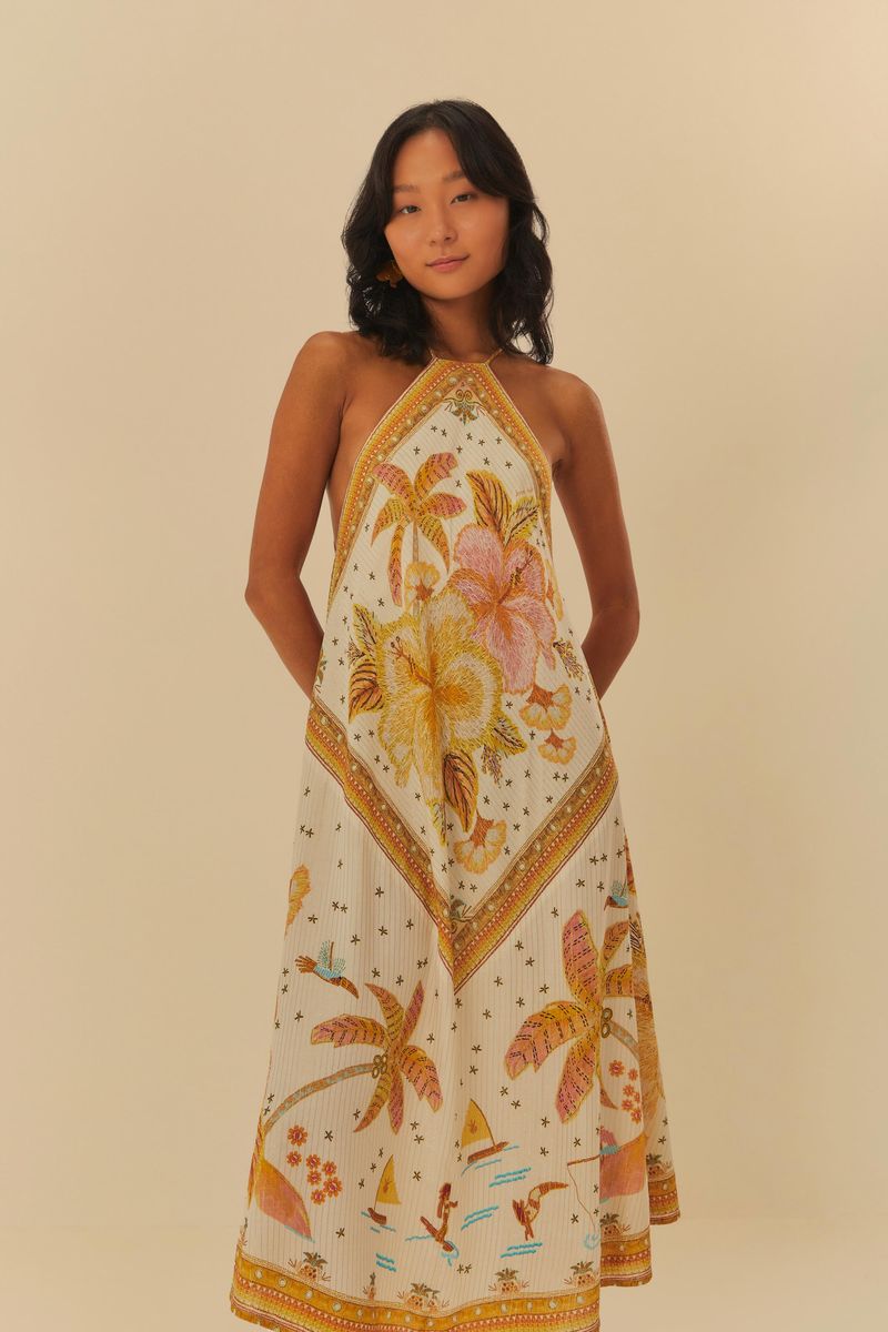 Vestido cropped con estampado floral en tonos cálidos, vista frontal.