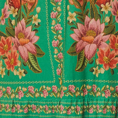 Acercamiento-al-corpiño-del-vestido-destacando-el-diseño-floral-y-los-detalles-decorativos.