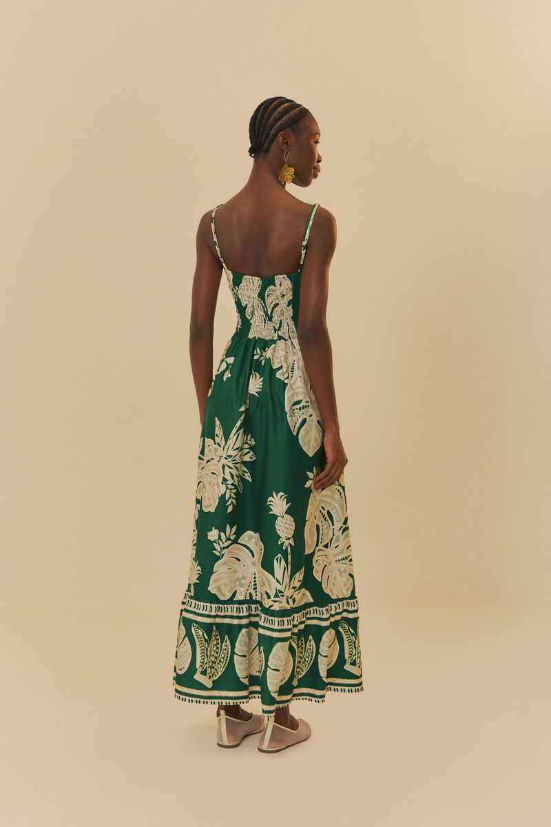 Vista-trasera-del-vestido-largo-con-estampado-botanico-y-tirantes-finos.