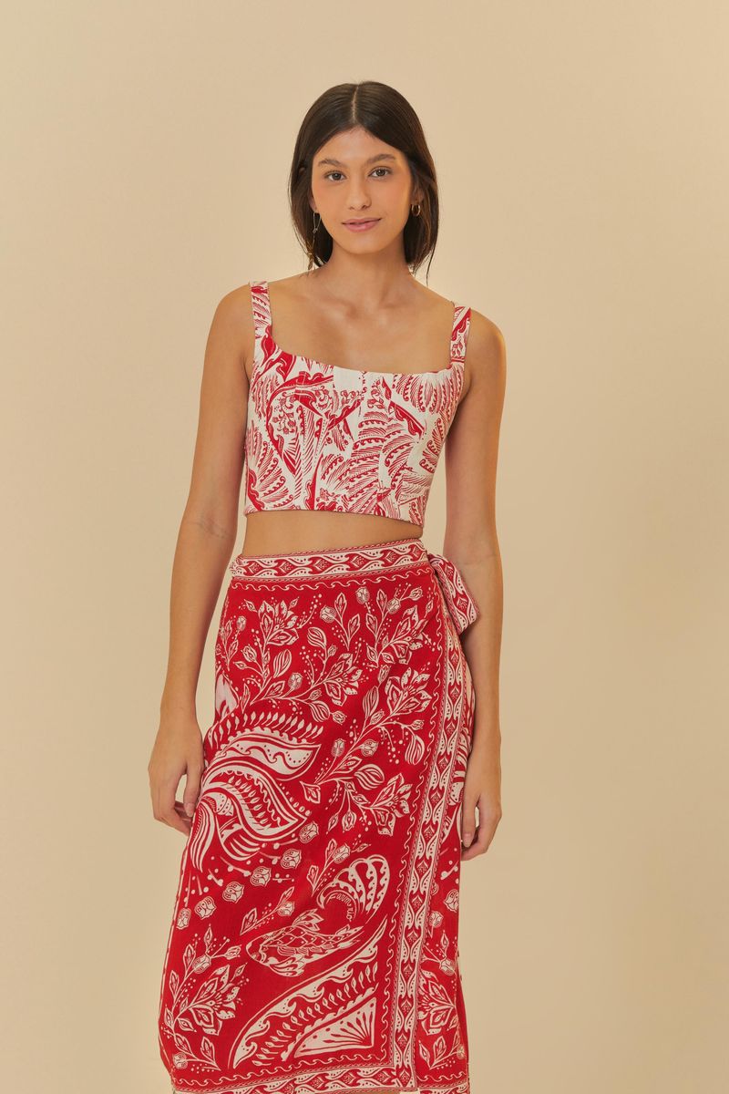 Falda pareo con estampado tropical en rojo y blanco, vista frontal.