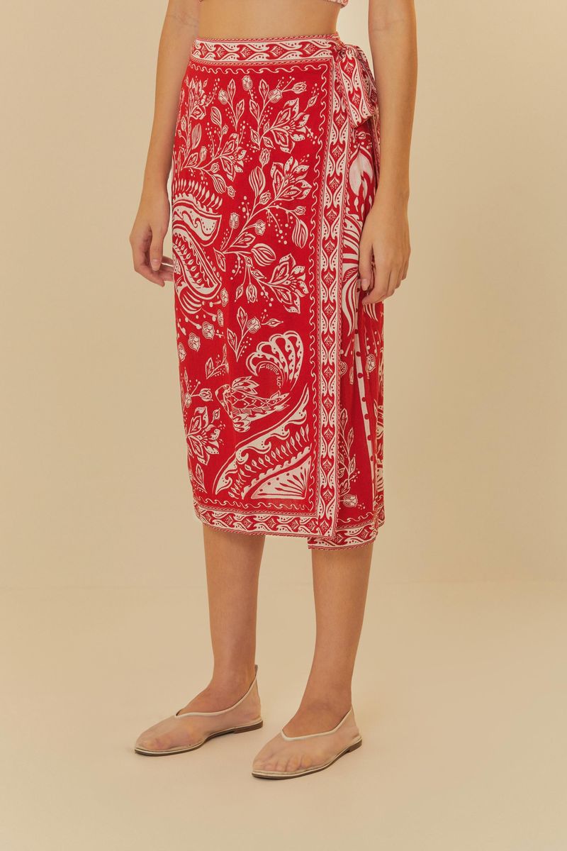 Falda pareo con estampado tropical en rojo y blanco, vista trasera.