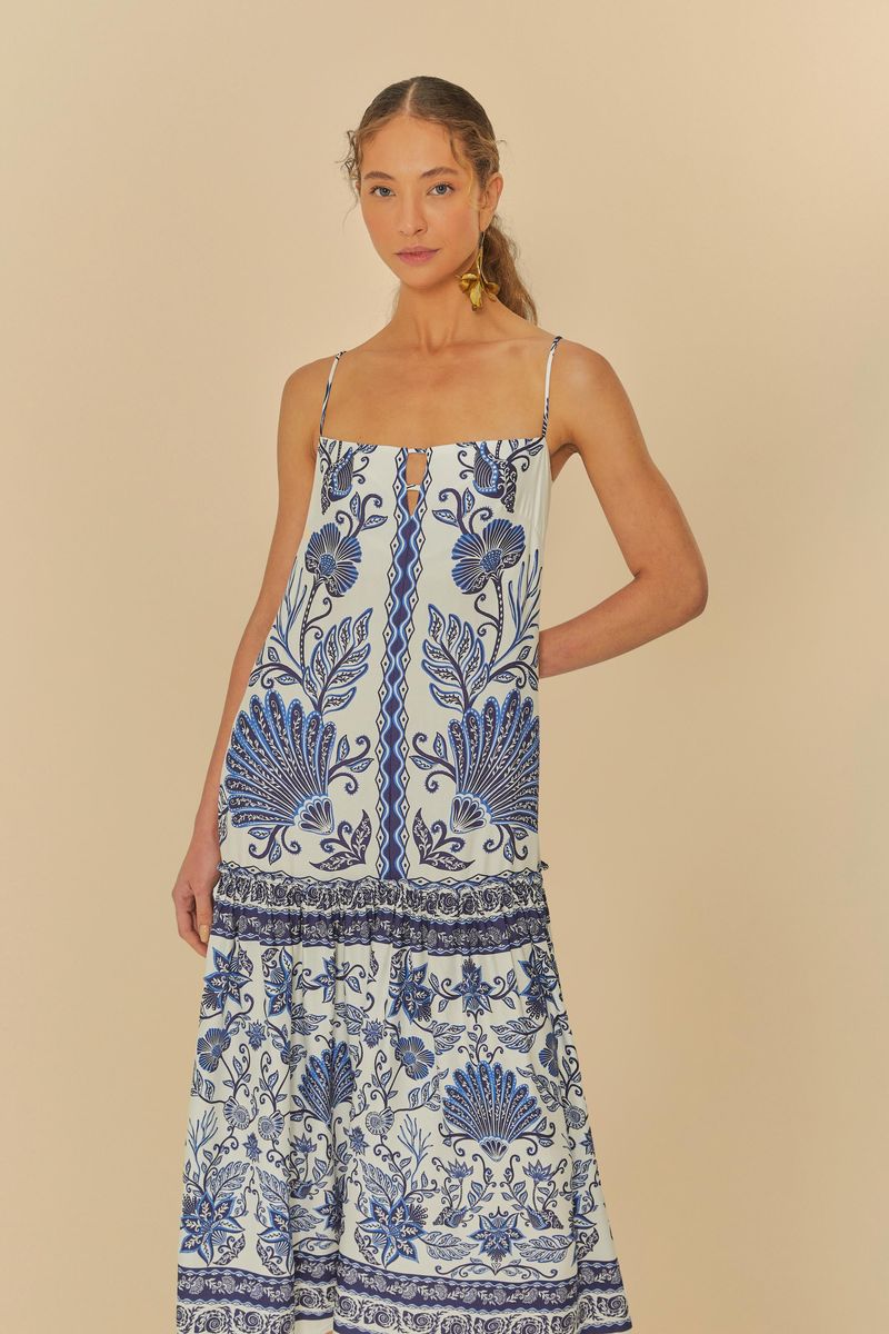 Vestido cropped con estampado botánico azul, vista lateral.