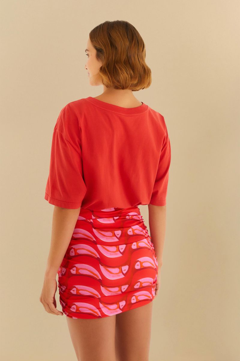 Vista trasera de la falda estampada con tucanes en repetición.