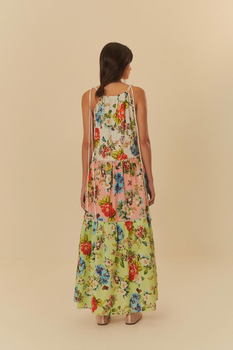 Vista trasera del vestido floral largo con tirantes finos.