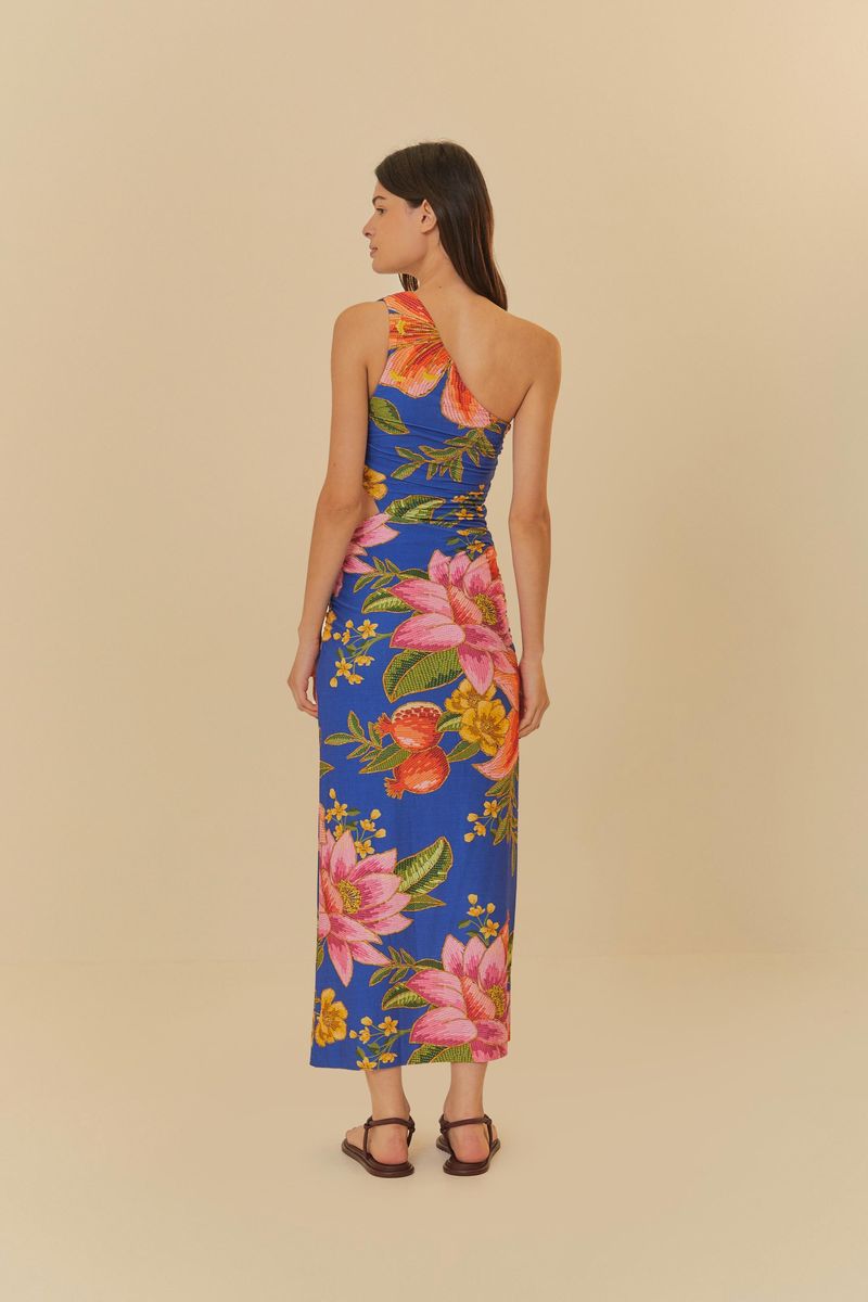 Vista trasera del vestido midi tropical, mostrando el diseño de un solo hombro y el estampado vibrante.