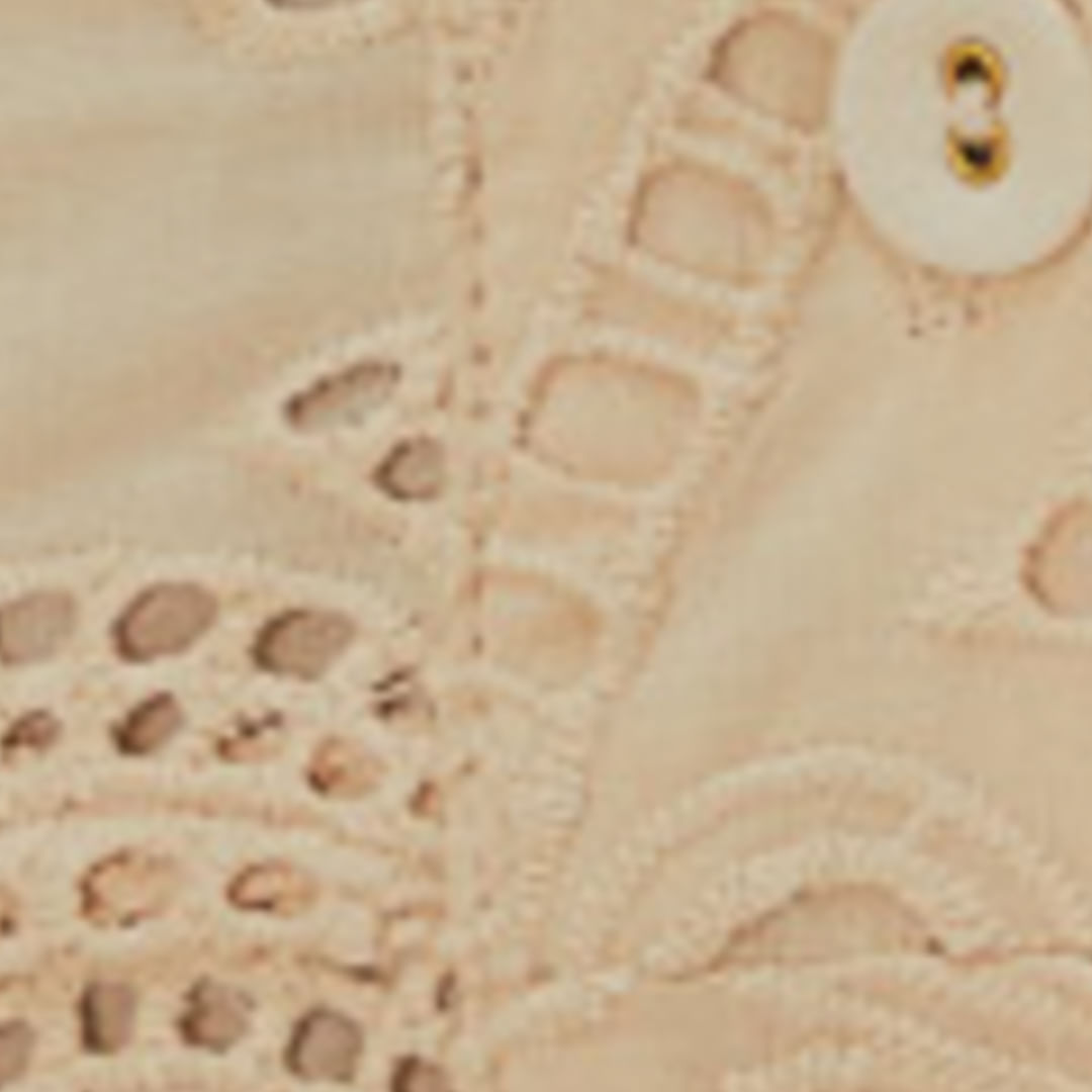 Close-up-de-la-tela-laise-del-vestido.