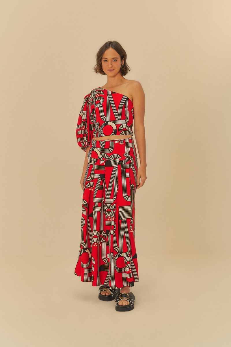 Blusa de un Solo Hombro Logotuca con estampado geométrico en rojo y negro, conjunto completo con falda a juego.