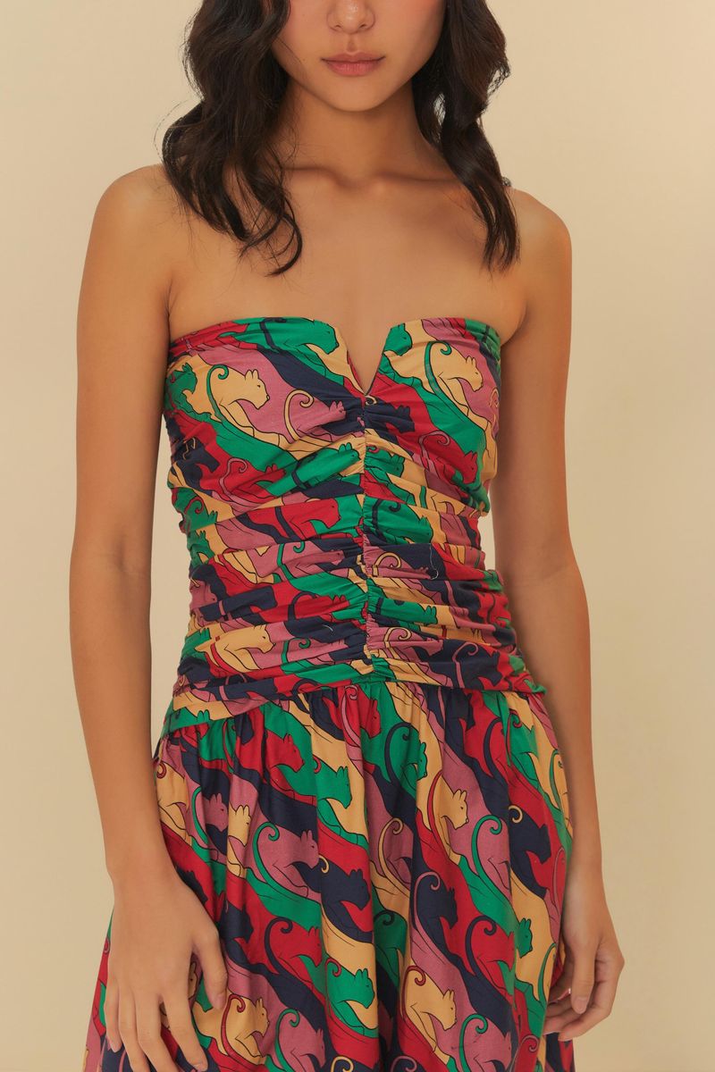 Vestido largo con estampado de panteras en colores vivos, detalle del corsé.