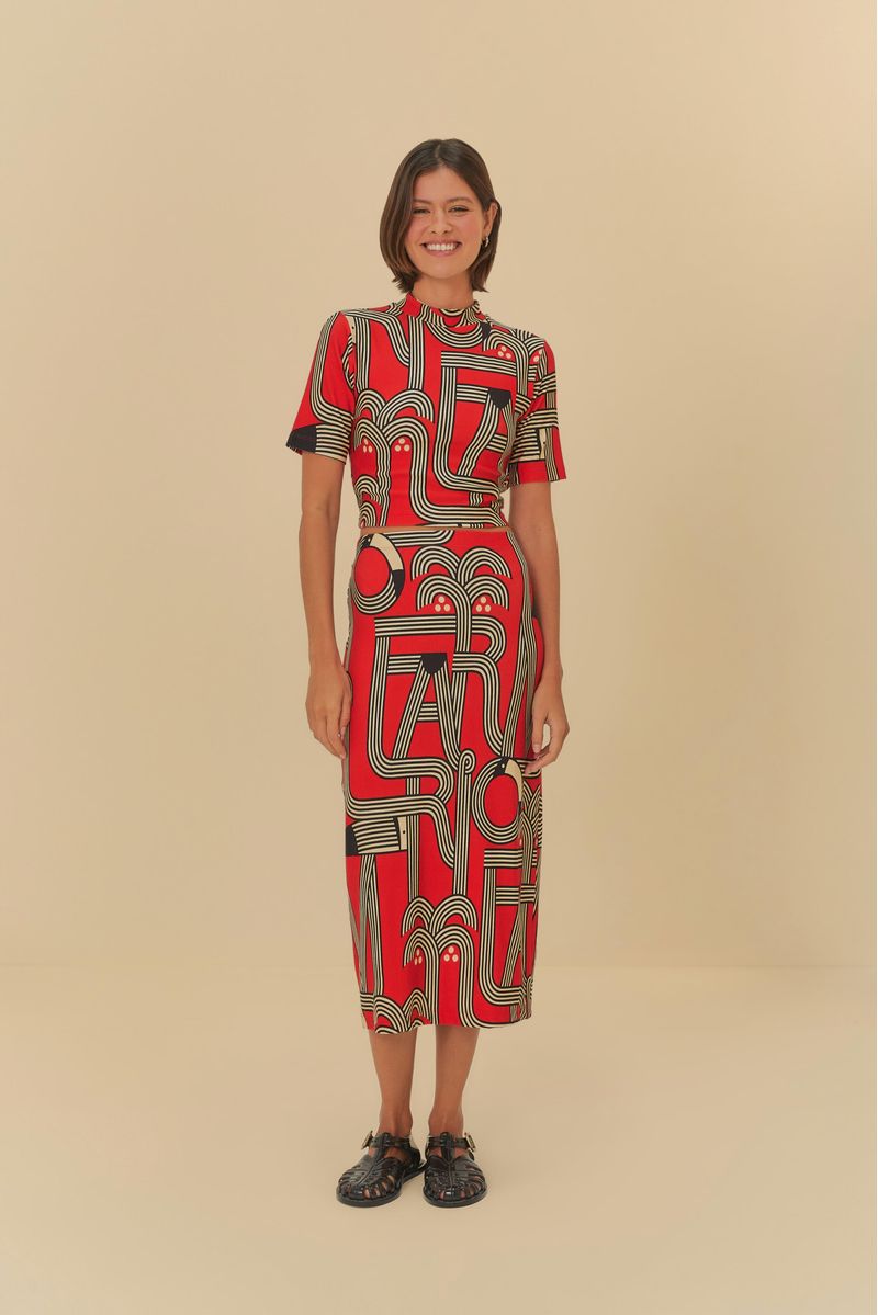 Vista frontal de la falda midi Logotuca con estampado geométrico en rojo, negro y beige.