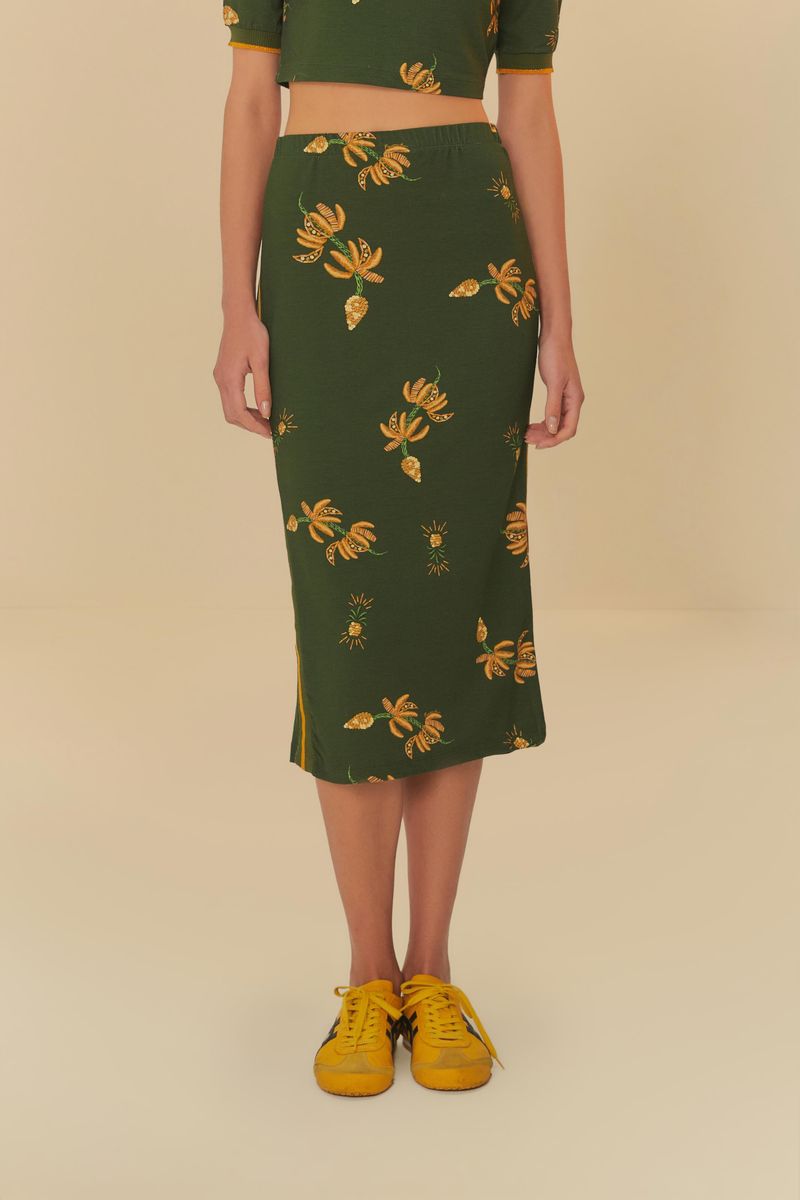 Primer plano de la Falda Midi Brillo de Banana mostrando detalles del estampado tropical.