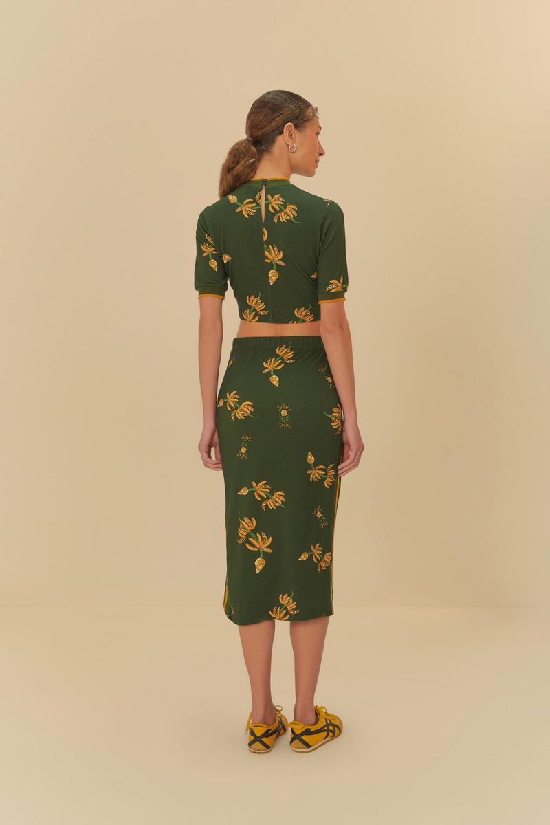 Vista trasera de la Falda Midi Brillo de Banana con estampado tropical, destacando el largo midi.