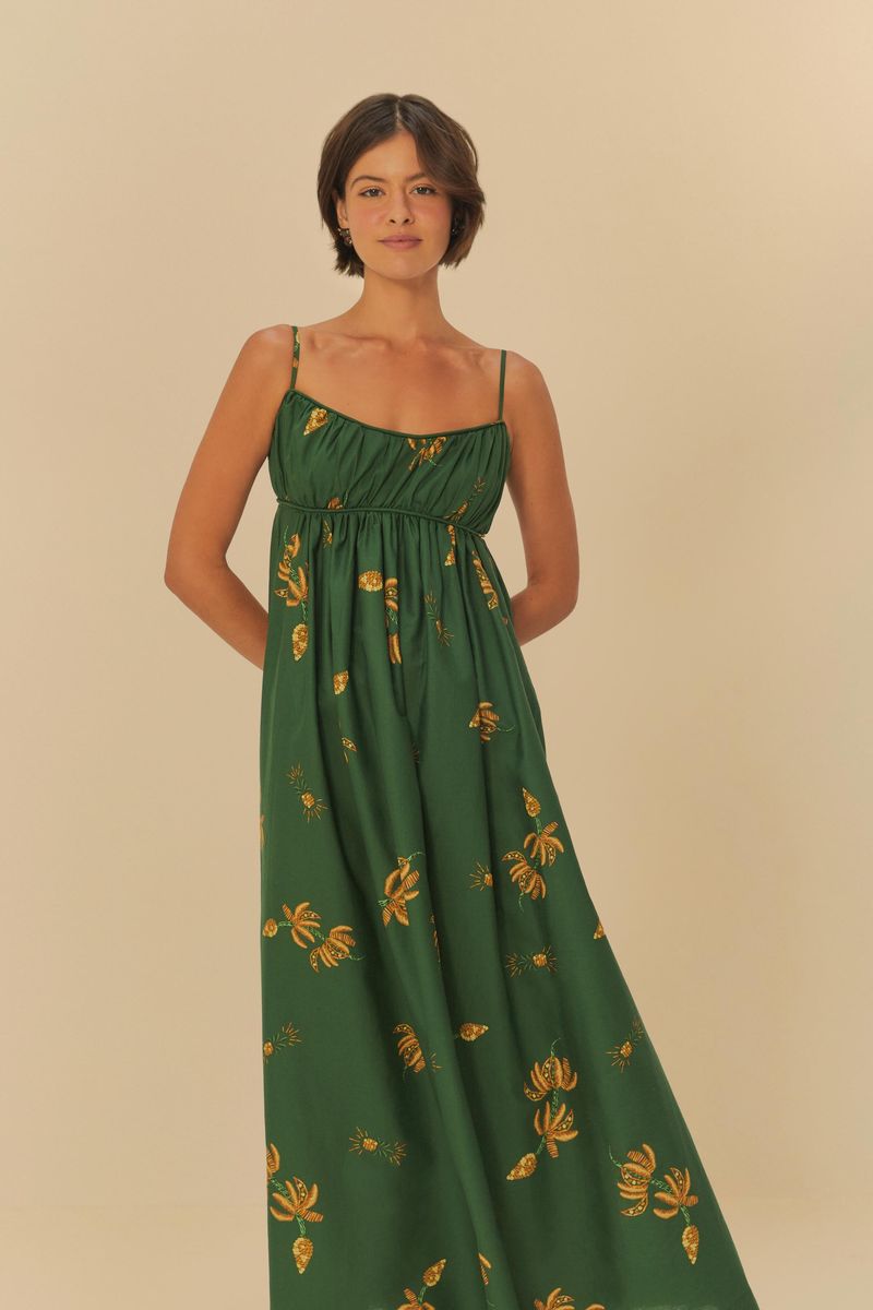 Vestido-largo-verde-con-estampado-de-bananos-amarillos-tirantes-delgados-y-escote-redondeado-visto-de-frente.