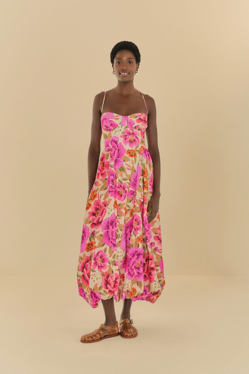 Vestido largo estampado con tiras delgadas, mostrado de frente.