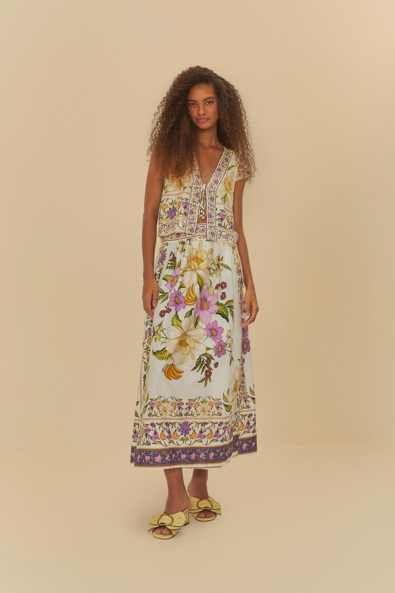 Vista frontal de la Falda Cruzada Belo Jardín con estampado floral vibrante.