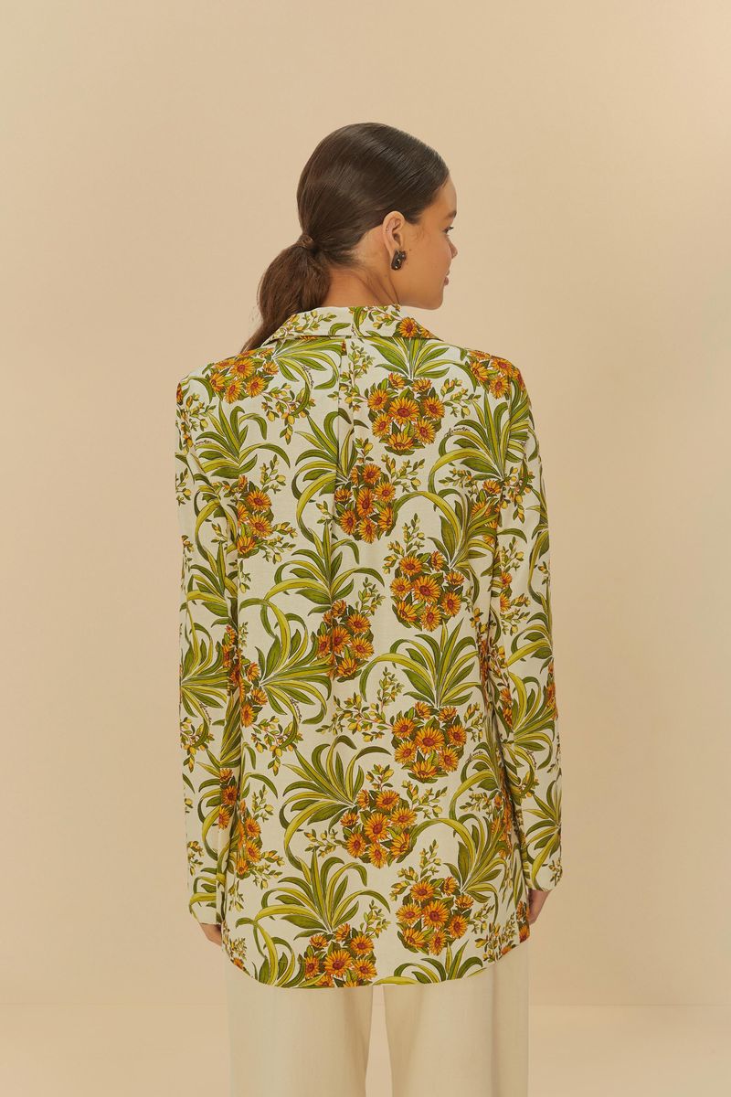 Vista trasera de la Blusa Hombro a Hombro Abacaflor con estampado floral vibrante.