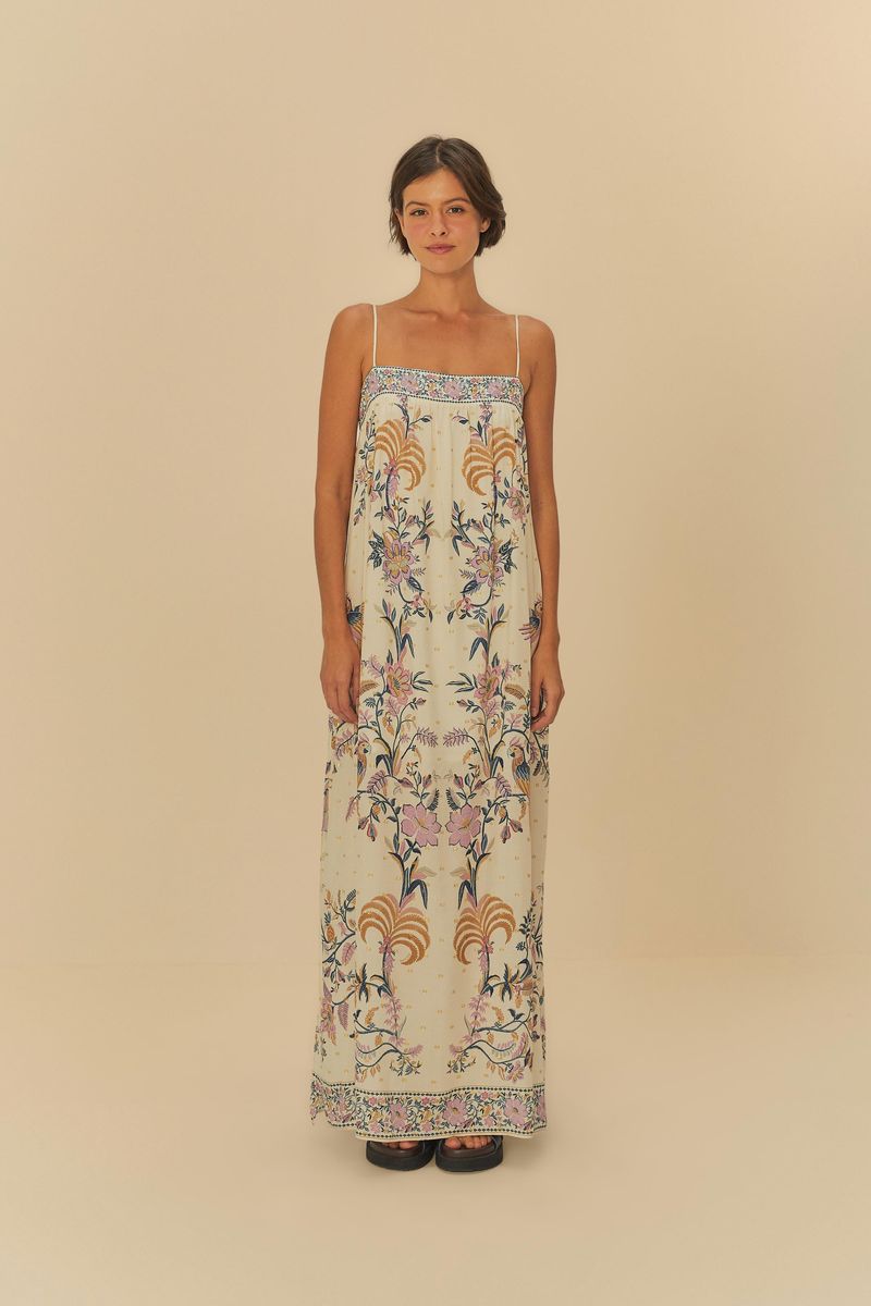 Imagen mostrando un vestido largo estampado con tirantes delgados, visto de frente.