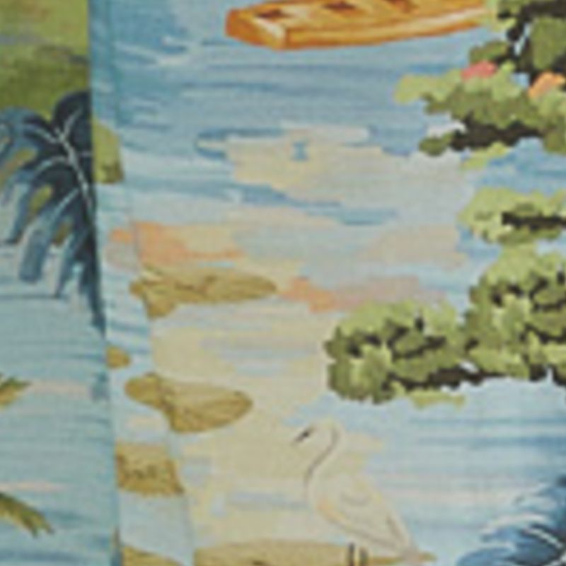Detalle del estampado paisajístico de la falda, con elementos naturales como árboles y montañas.