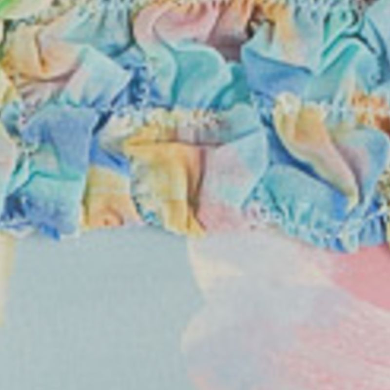 Close-up del estampado floral tropical de la Blusa Lastex Mangas Floral Sofia.
