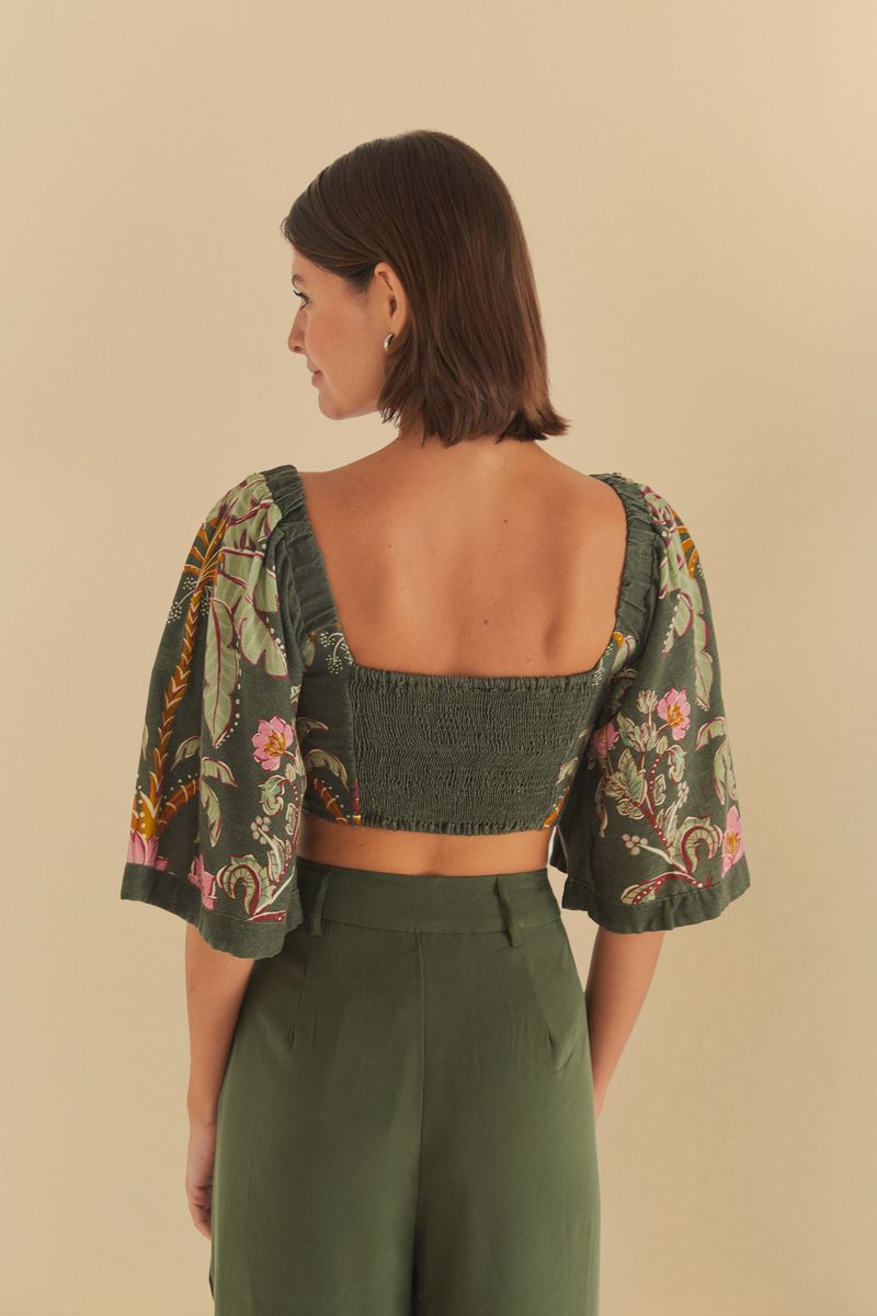 Vista trasera de la Blusa Ravenala S mostrando el diseño con elástico.