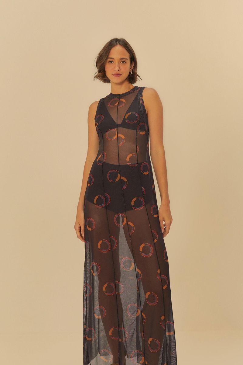 Vista frontal del vestido de tul con estampado de círculos coloridos.