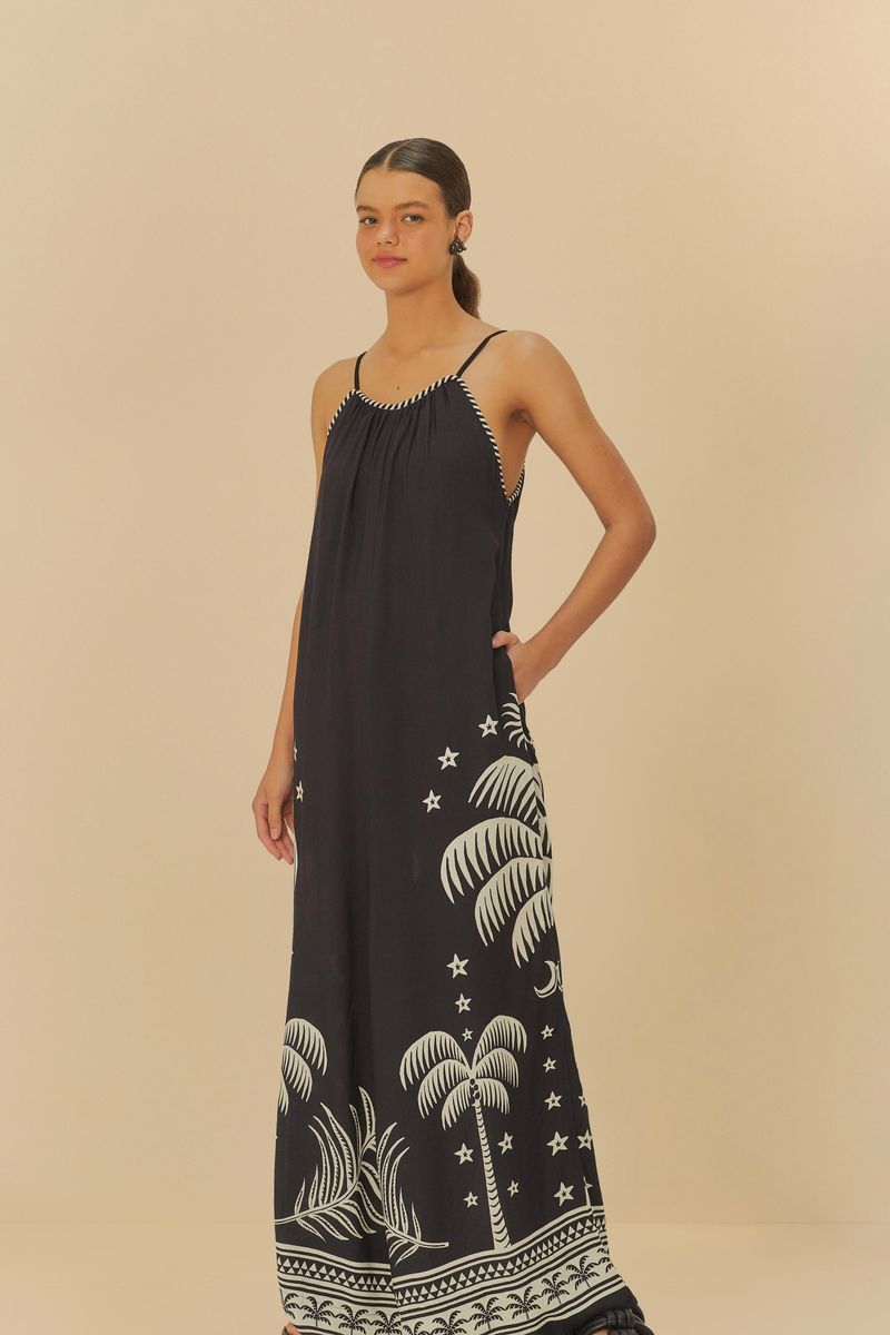 Macacón Pantalona Coqueiral visto de frente, destacando su estampado tropical y diseño cómodo.