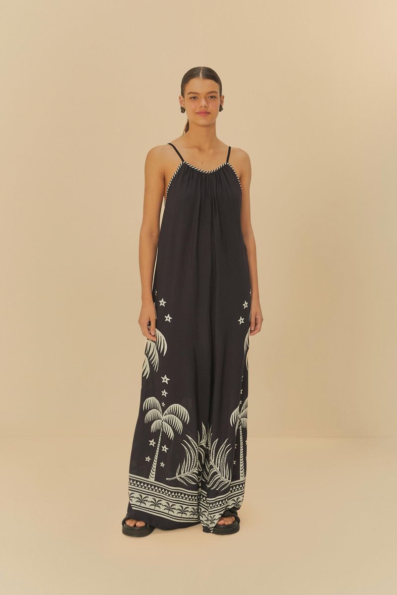 Macacón Pantalona Coqueiral visto desde atrás, mostrando el detalle del escote halter y estampado.