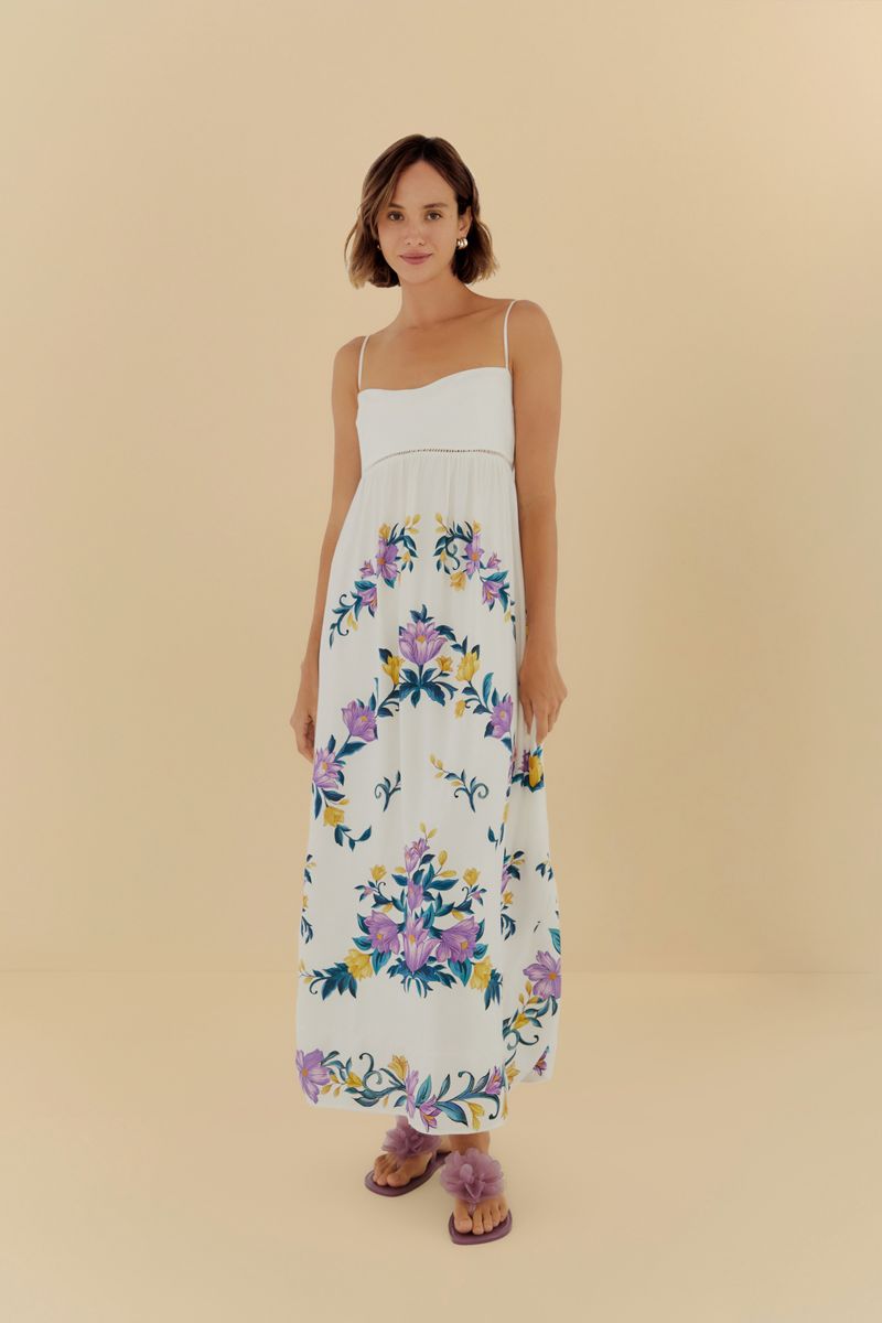 Imagen de un vestido cropped floral Sicilia visto de frente, con tirantes finos y estampado floral vibrante.