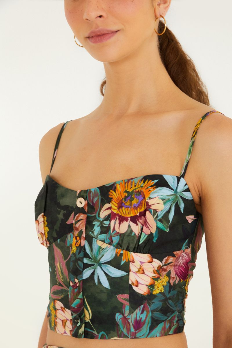 Imagen de una blusa floral con escote en V y tirantes finos, vista trasera.