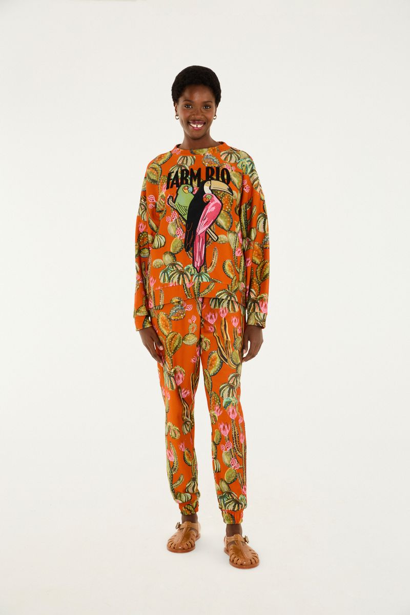 Cardigan estampado con tema botánico, visto desde atrás.