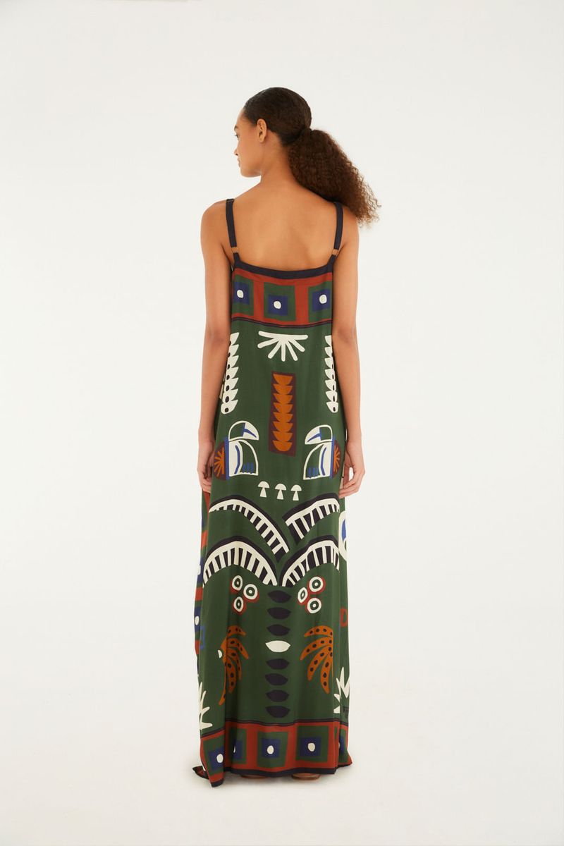 Vestido midi con estampado tropical, tirantes delgados y diseño fluido visto desde atrás.