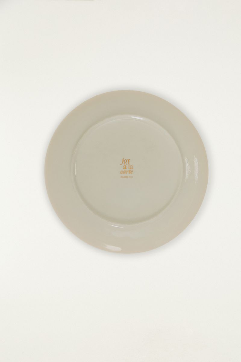 Parte trasera del plato llano Joy a La Carte Libélula, mostrando el acabado.