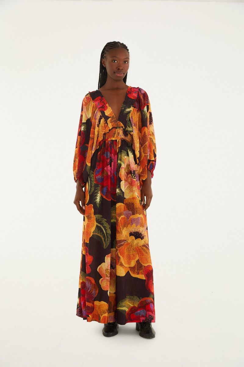 Mono estampado floral con escote en V y mangas largas, visto de frente.