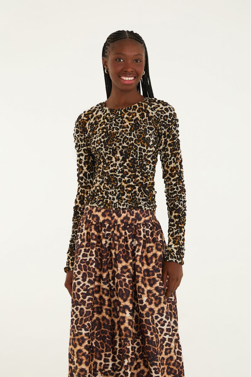 Saia Bella Onza con estampado de leopardo en tonos tierra, vista frontal.