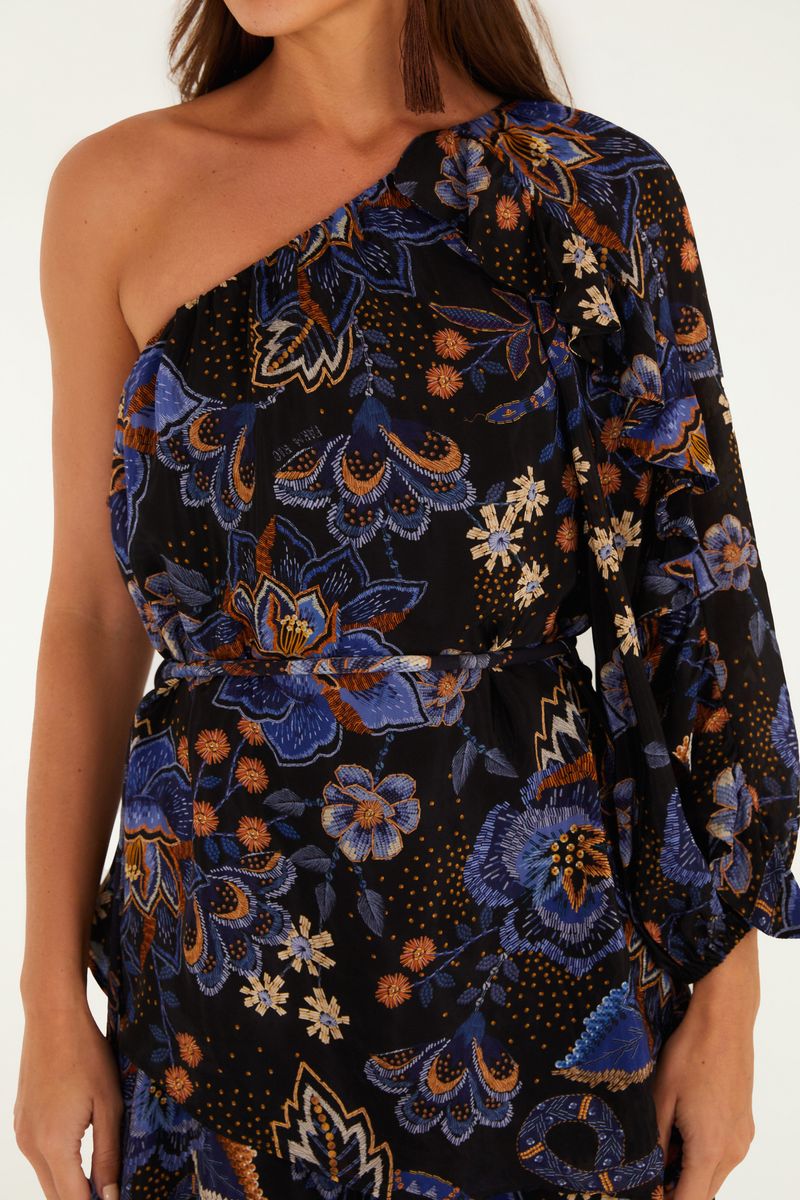Detalle del corsé del vestido, mostrando el estampado floral y el ajuste en la cintura.