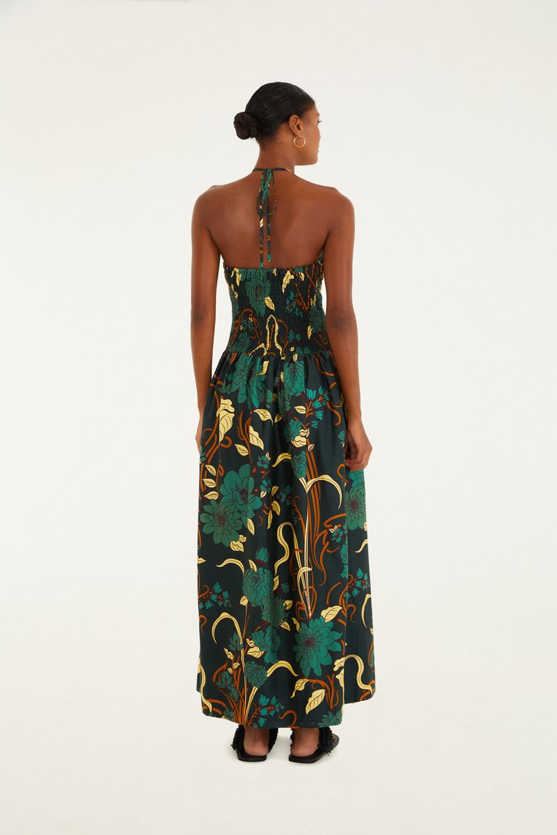 Vista completa del vestido midi con estampado floral, mostrando su largo y diseño.