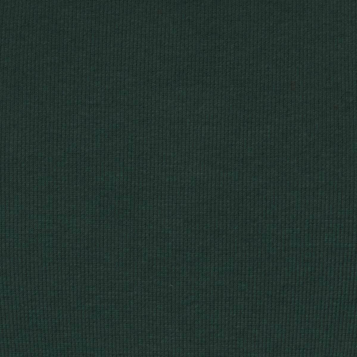 Detalle de la tela rib verde oscuro del vestido.