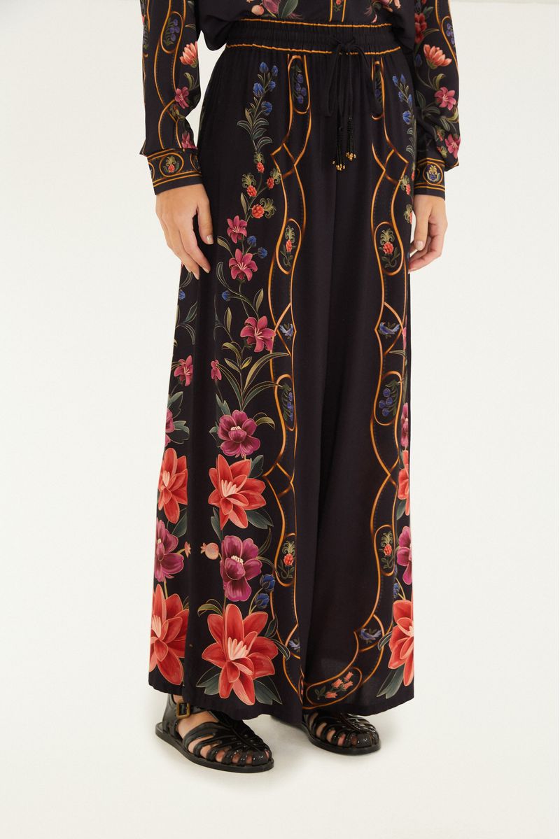 Vista trasera de los pantalones tipo palazzo floral Belle con estampado botánico.